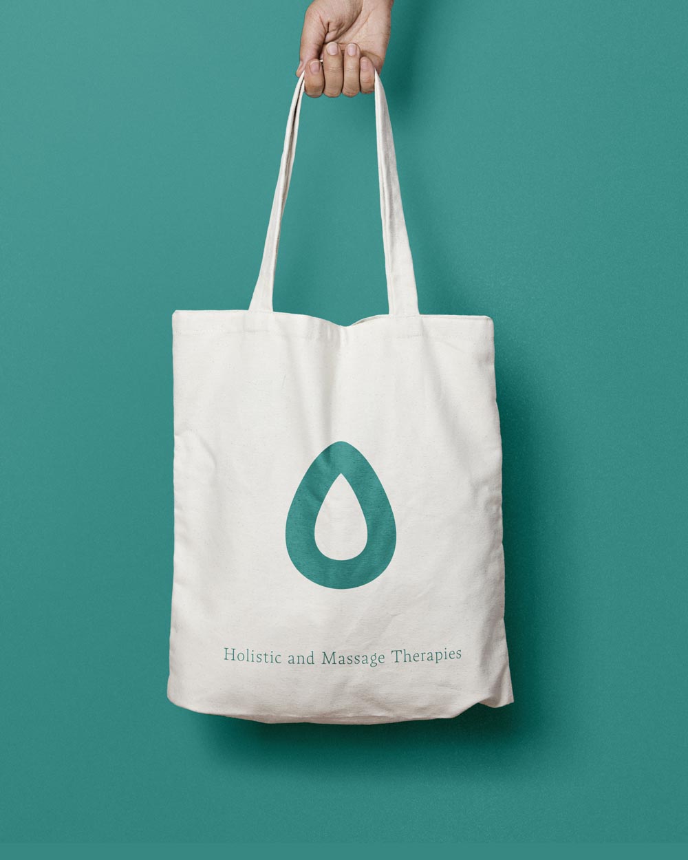 Tote bag com identidade visual Almond Tree Therapies - aplicação da marca em merchandising